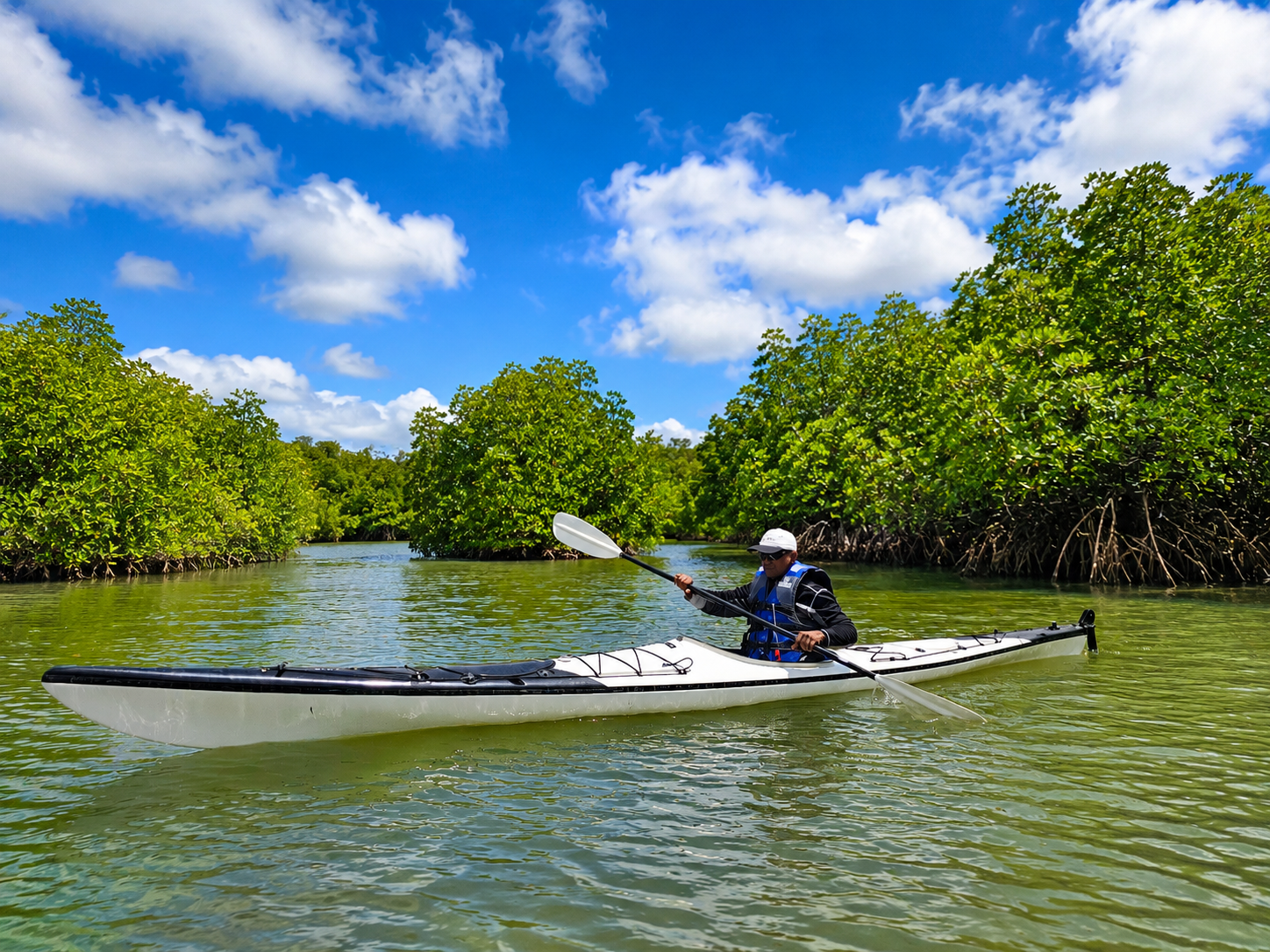 Kayaking through the natural waterways of Thoduwawa